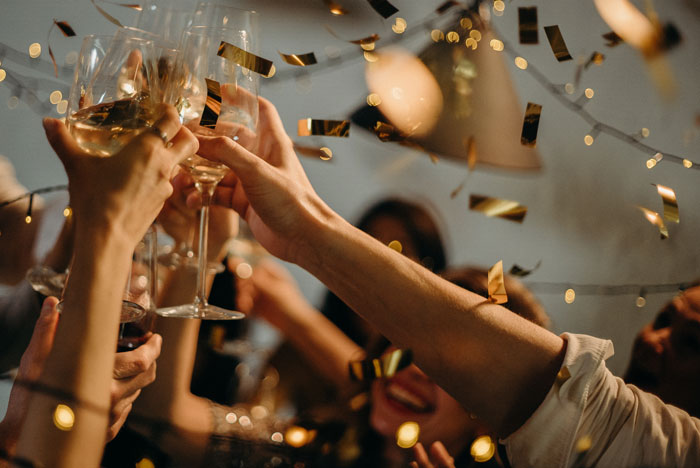 People Toasting with Wine Glasses