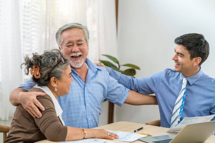 Real Estate Agent helping couple 